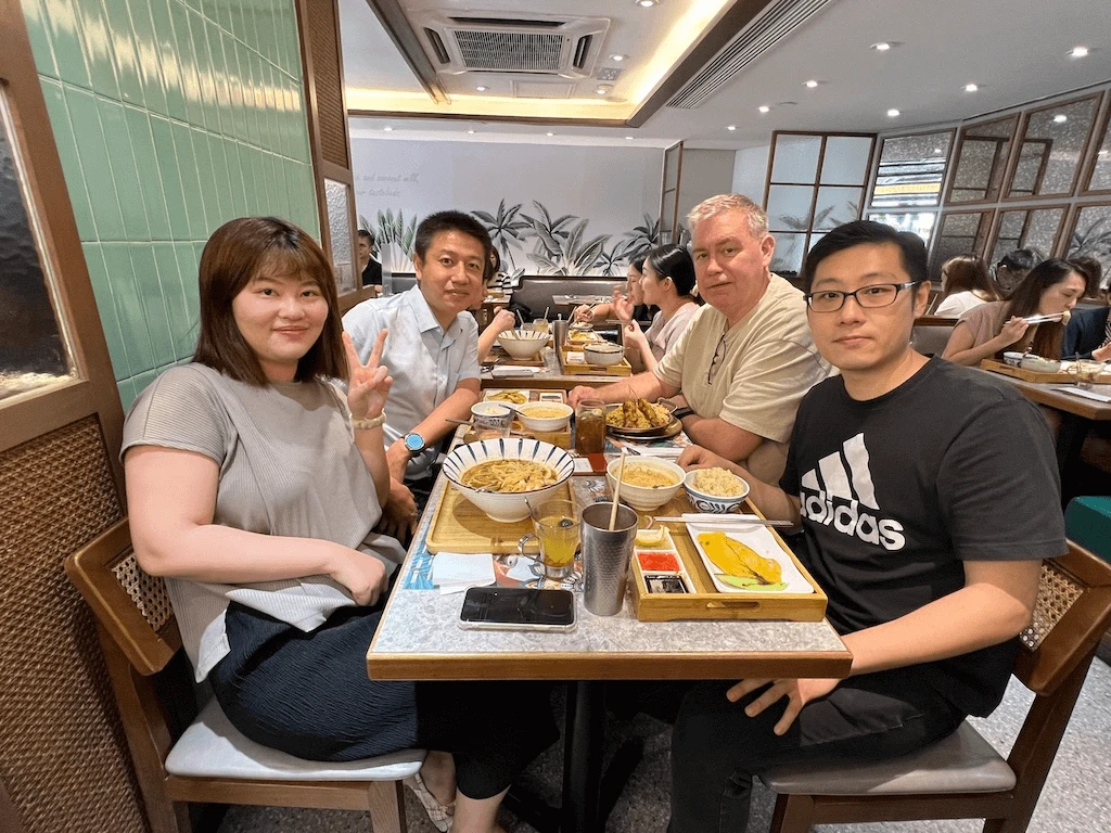 MTS colleagues sharing a team meal